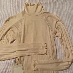Line by K open back turtleneck top